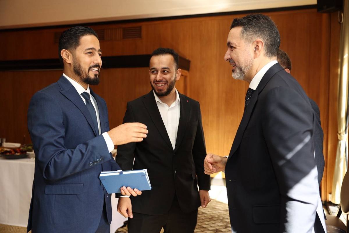Mustafa with delegates